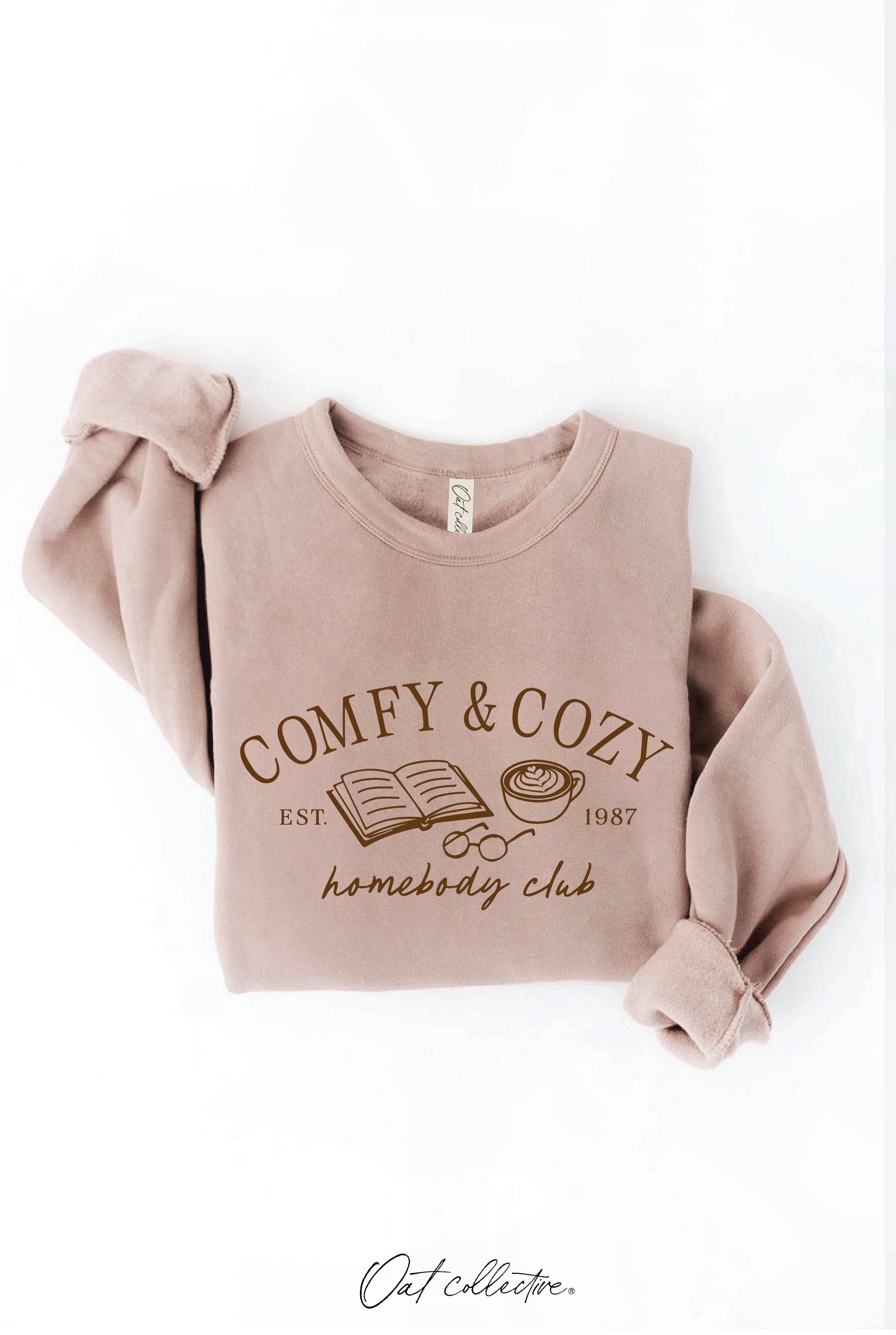 OAT COLLECTIVE – Camisola gráfica - Mulher por atacado – Moletom Gráfico Unissex COMFY AND COZY HOMEBODY CLUB5