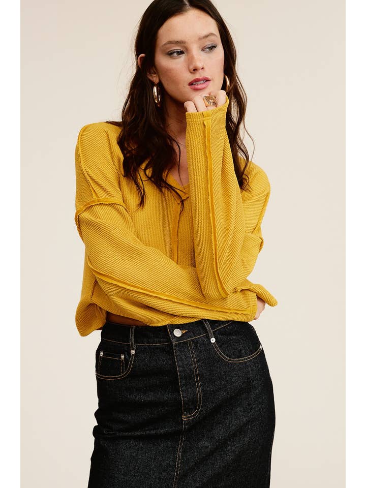 Mustard Exposed Seam V Neck Long Sleeve Oversized Sweater for wholesale on Faire