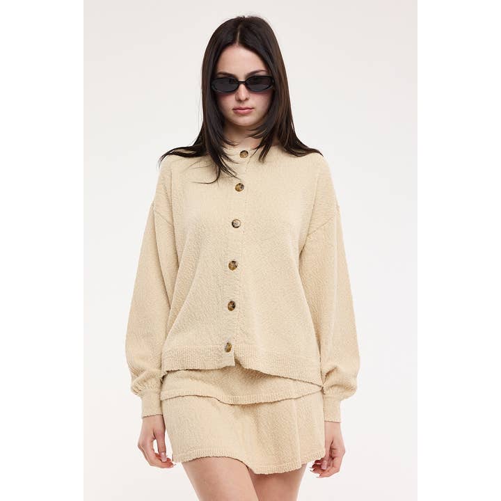 ENSEMBLE PULL EN MAILLE BOUTONNÉ PASTEL & MINI JUPE-COURTE pour la vente par Sky to Moon