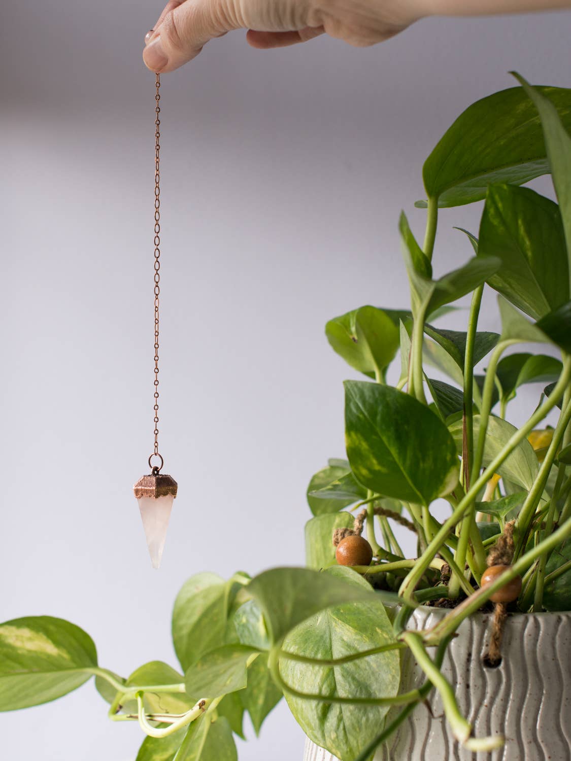 The Cyprus Cabinet - Wholesale Spiritual Stone/Crystal - Rose Quartz Copper + Crystal Pendulum2