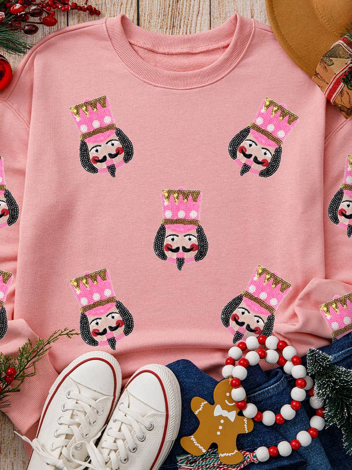 As shown Sequin Nutcracker Christmas Graphic Sweatshirt | S-2XL for wholesale on Faire
