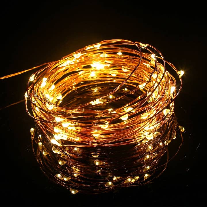 Bianco caldo/filo di rame. 100 LED di poliziotto naturale. Luci fatate (batteria) con filo di rame in vendita all'ingrosso su Faire