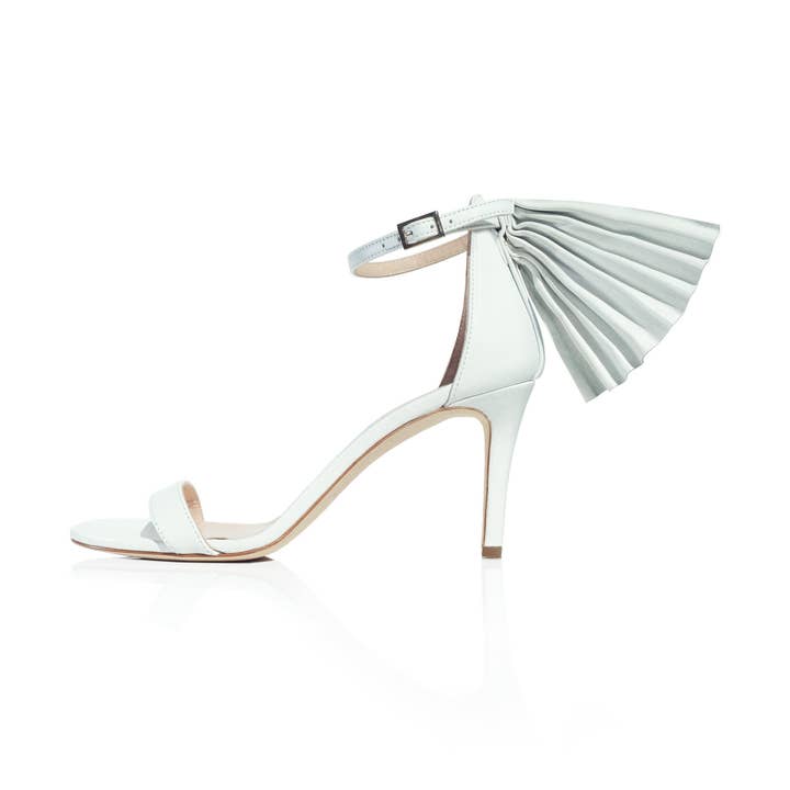 Palma-sandal i vitt för wholesale av Susana Madrid