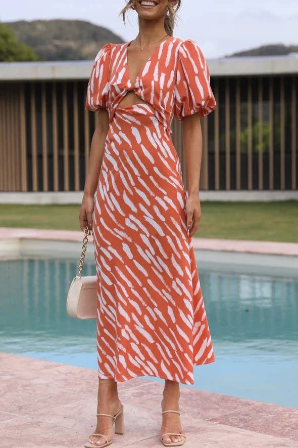 Rosa Clothing - Wholesale Dress - Women's - zebra print plunge twist front cutout puff sleeve dress6