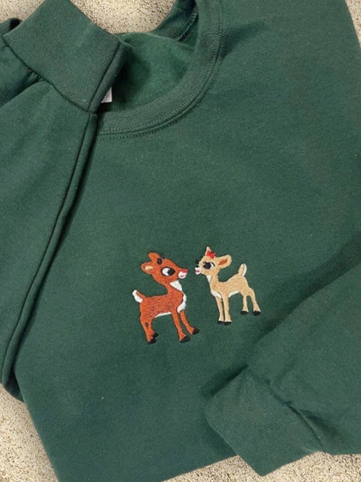 NufNuf Creations - Wholesale Sweatshirt - Unisex - rudolph theme embroidered crewneck sweater1