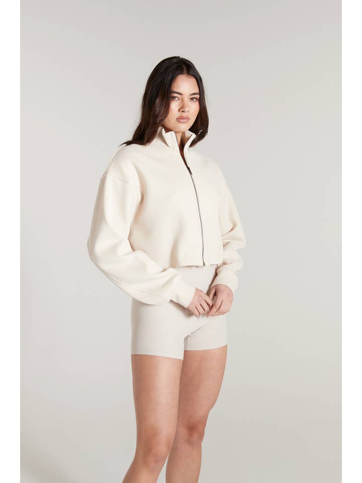 Shell Lily Full Zip Sweater (Shell) for wholesale on Faire