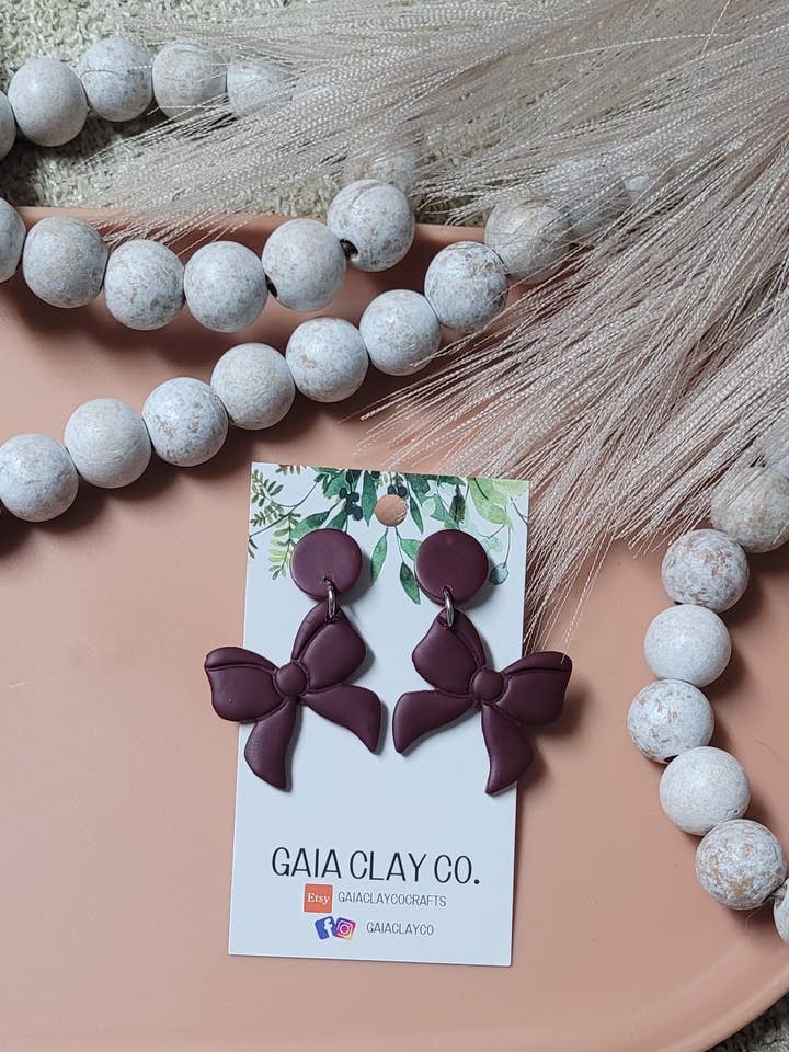 Game Day Maroon Bows for wholesale by Gaiaclayco