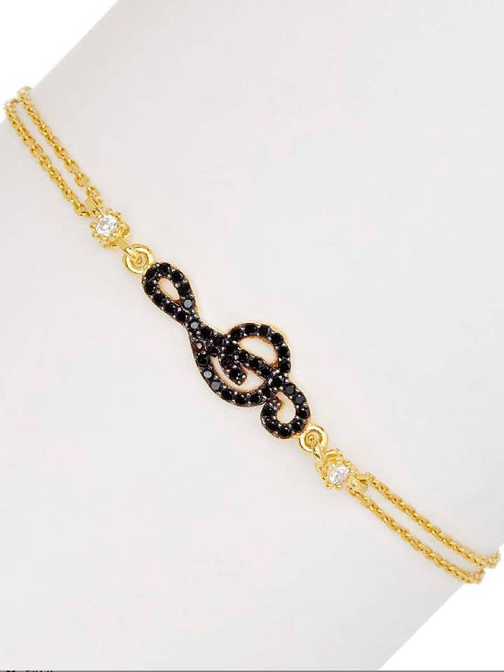 Musical Clef Bracelet Sterling Silver Adjustable, 7+1 Inch Gold Plated Black Spinel and CZ Clef Center, Musical Girls Bracelet, Gift Boxed for wholesale by Dynasty Gold Jewelers, Inc.