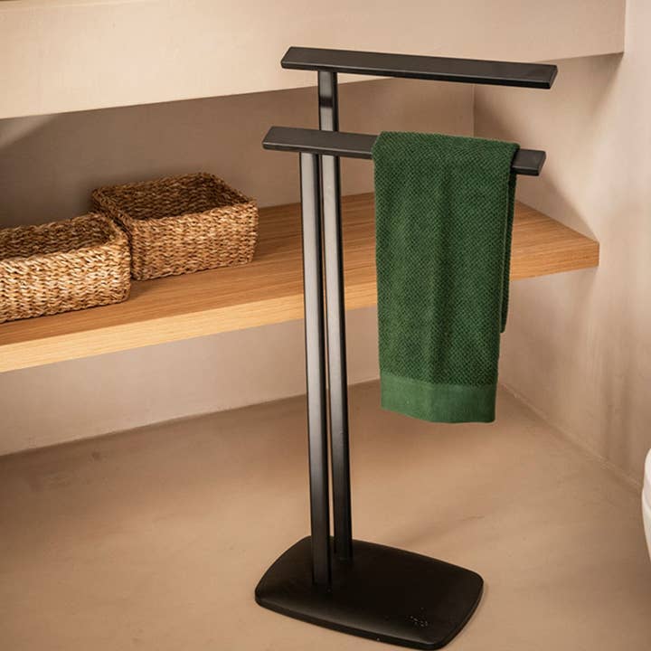 Modern black metal standing towel rack for wholesale by Andrea House