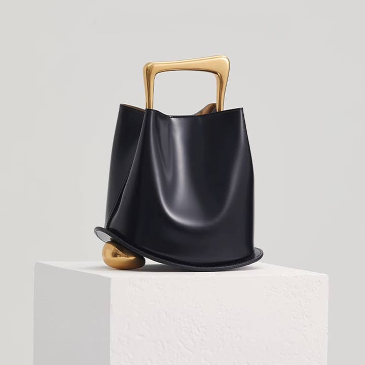 Ozzy Bag - Black & Gold for wholesale on Faire