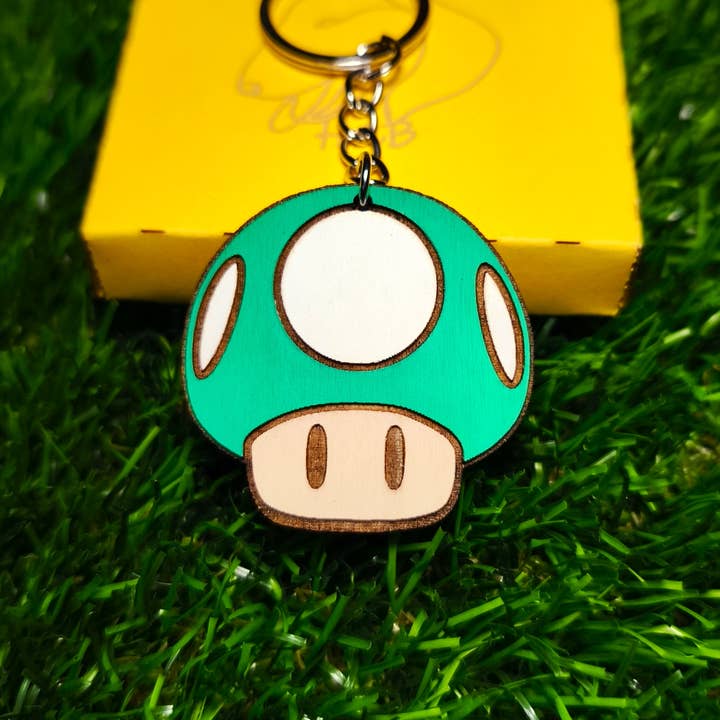 Super Mario Nøglering i Træ – 1-UP Svamp Gamer Nøglering for engroshandel hos Herbs&Belles