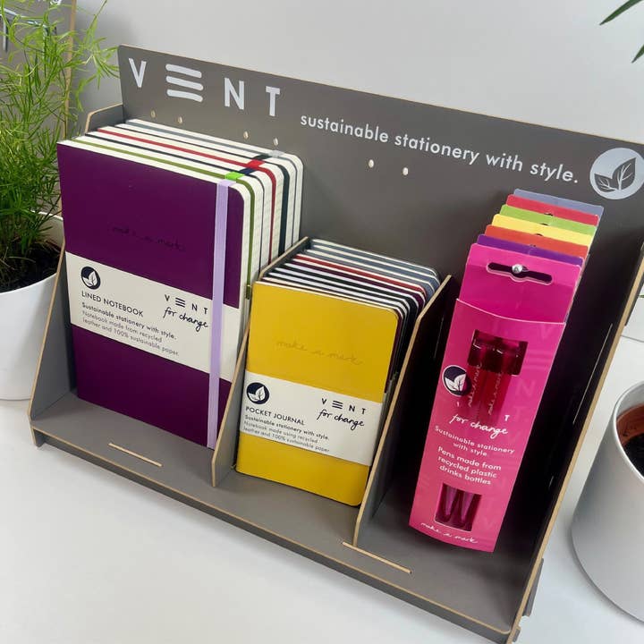 Multi-purpose notebook display stand and Hanging Unit for wholesale by VENT for Change USA