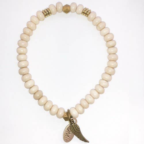 Diaspro Fossil color crema con quadratino dorato e dischi da 6 mm per la vendita all'ingrosso da parte di omibeads