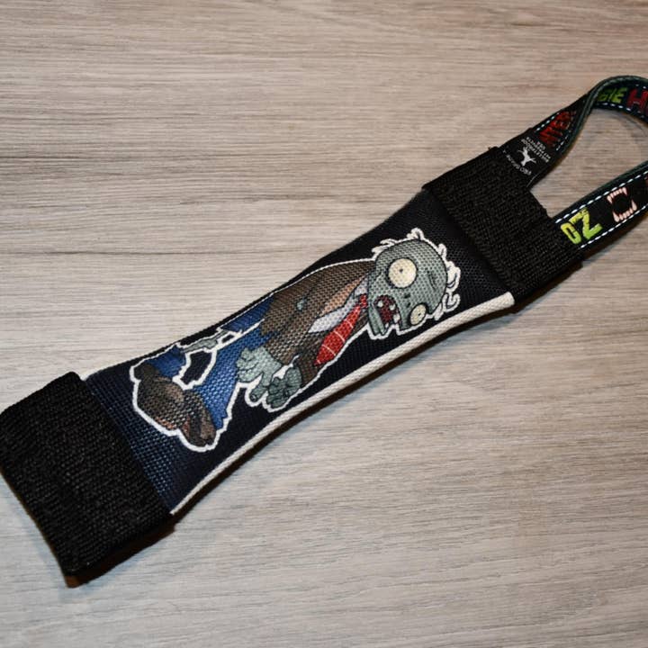 Zombie Hunter Fire Hose Squeaker Tug - One handle for wholesale by Bulletproof Pet Products