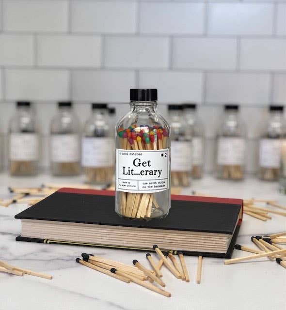 Fly Paper Products – Engroshandel Tændstikker – Get Lit...erary sikkerhedstændstikker i regnbue- eller sortflaske