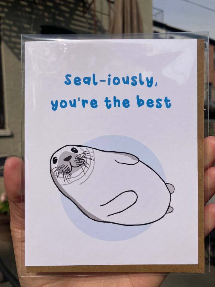 Biglietto d'auguri Chubby Harp Seal - «Seal-iously you're the best» per la vendita all'ingrosso da parte di Jenn L Design