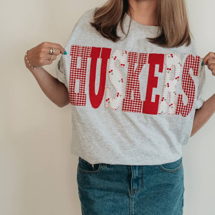 h.flynn - Wholesale T-Shirt - Women's - HUSKERS PATCHWORK TEE - GREY TEE1