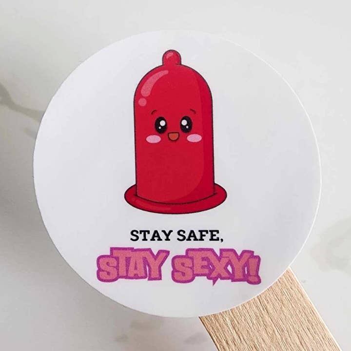 Stay Safe Pink Condom Vinyl Sticker Decal for wholesale by Jane Unbound