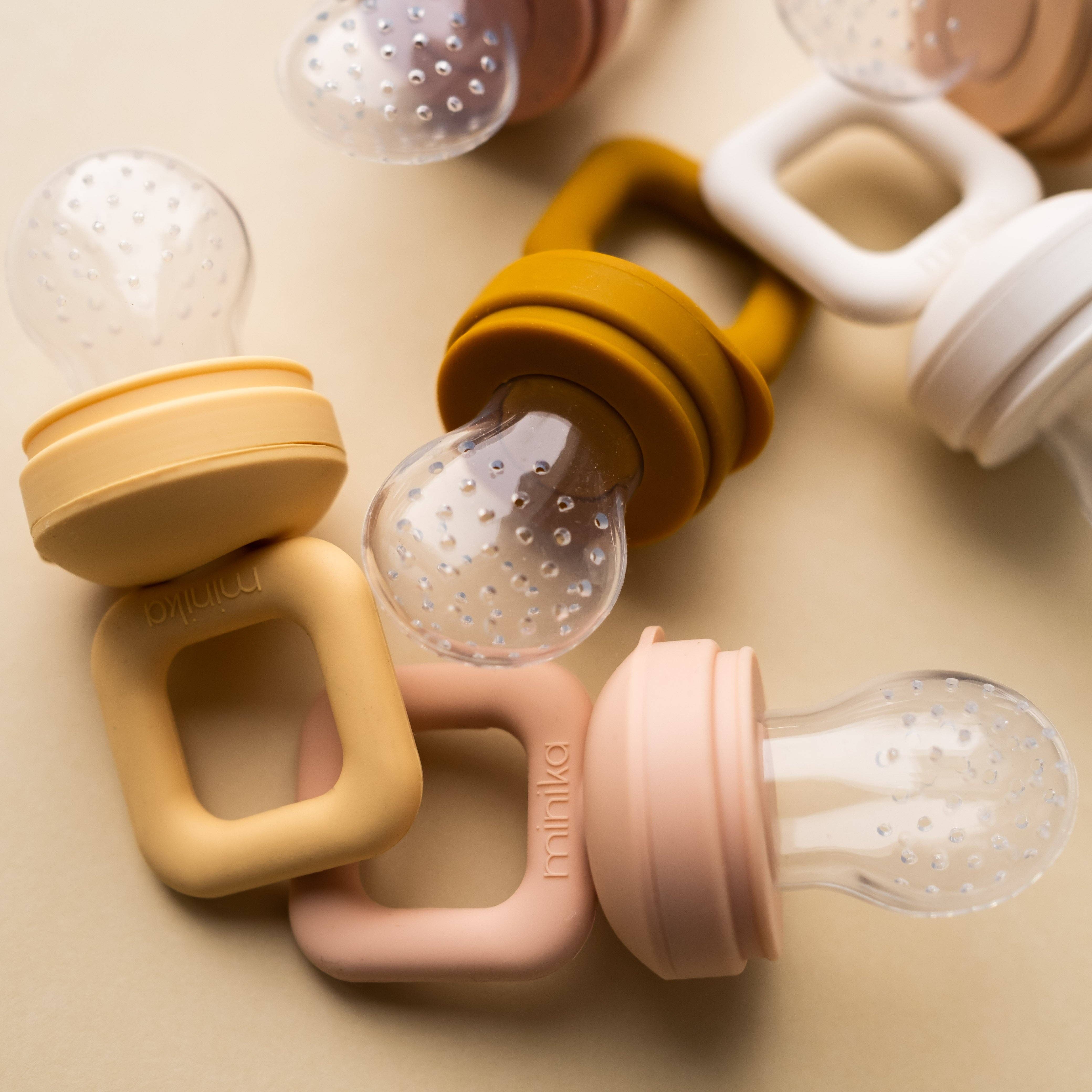 Minika – Mordedor - Bebé por atacado – Chupeta alimentadora mordedor de silicone - concha2