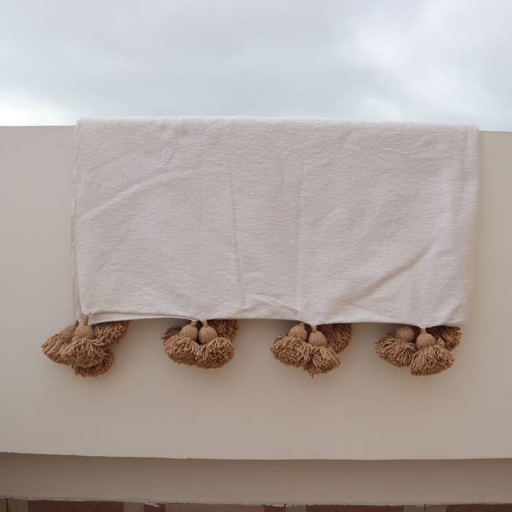 Pom Pom Blanket for wholesale by Nomad & Artisan