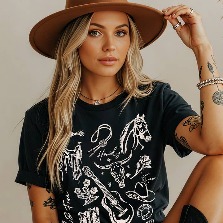 Women Western Graphic Print Short Sleeve Top and other Purchase Wholesale black tees. Free Returns & Net 60 Terms on Faire trending on Faire.