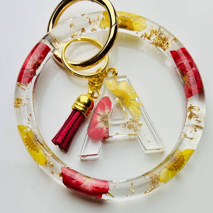 Ensemble de bracelet jonc porte-clés roses et tournesols en fleurs pour la vente par Shop Drip Express