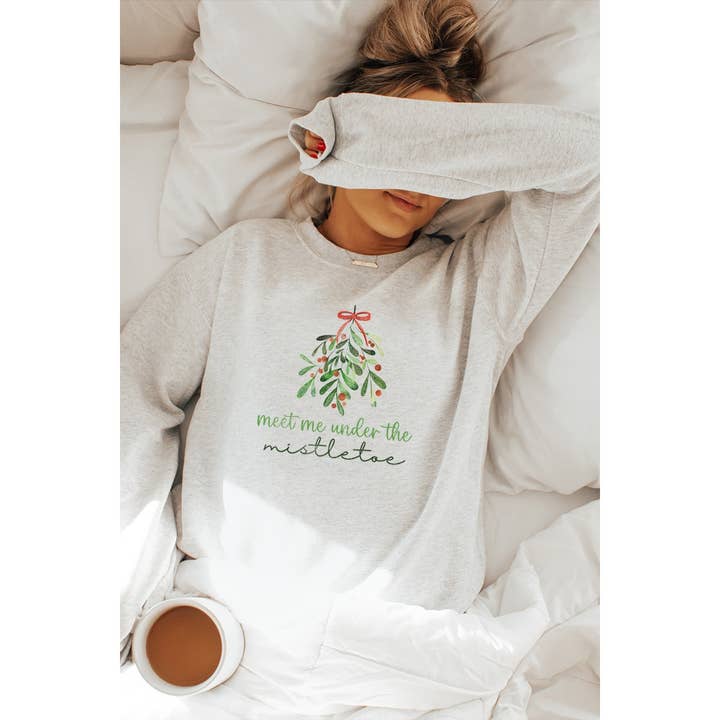 MEET ME UNDER THE MISTLETOE CHRISTMAS VINTAGE GRAPHIC SWEAT for wholesale by Illustrated Society