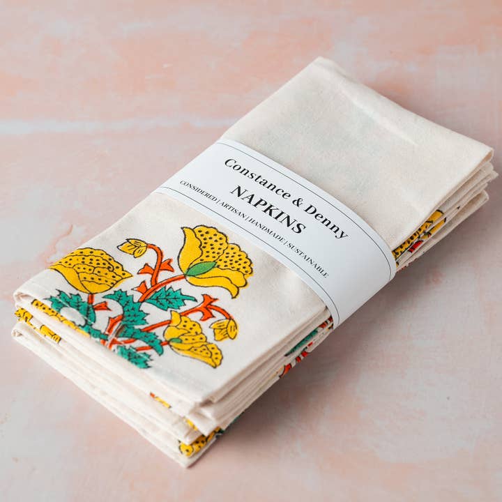 ENSEMBLE DE 4 SERVIETTES EN COTON FLEUR JAUNE pour la vente par Constance & Denny