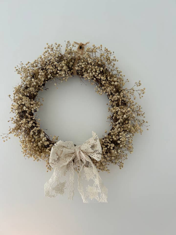 ‘Jazmin’ Gypsophila Wreath finished with a lace bow for wholesale by Cotswolds Willow Wreaths