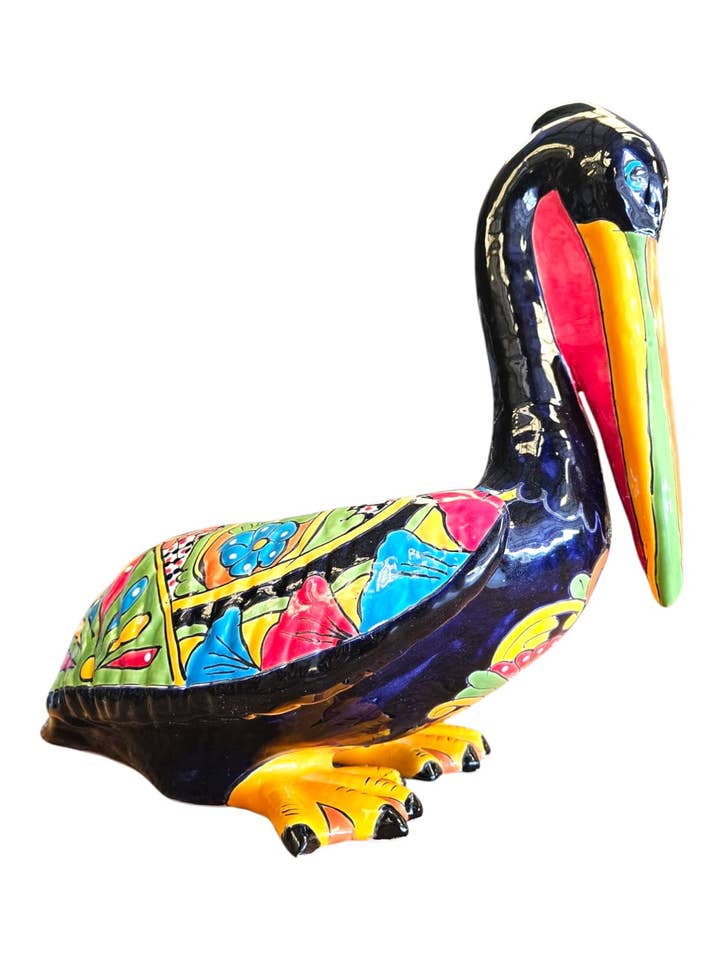 PELICAN FIGURE for wholesale by Pottery Express