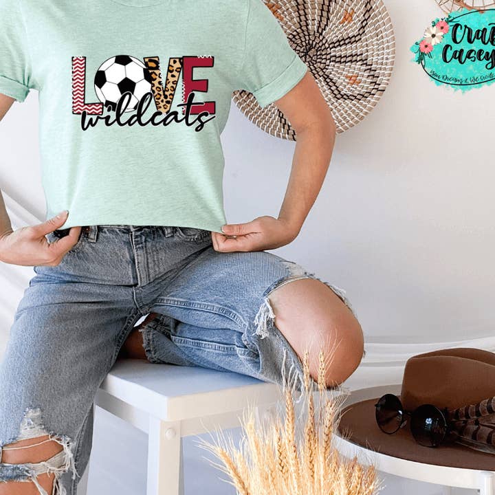 Love The Wildcats Soccer Red Unisex Tee for wholesale by Crafty Casey's Wholesale