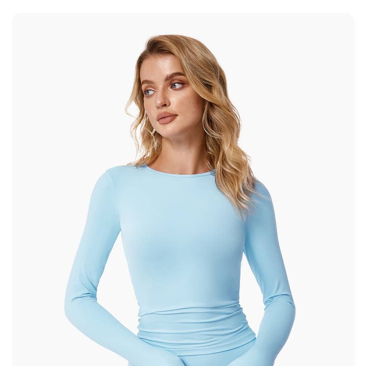 Abigail Buttery Soft Crew Neck Long Sleeve Active Top and other Purchase Wholesale gym apparel. Free Returns & Net 60 Terms on Faire trending on Faire.