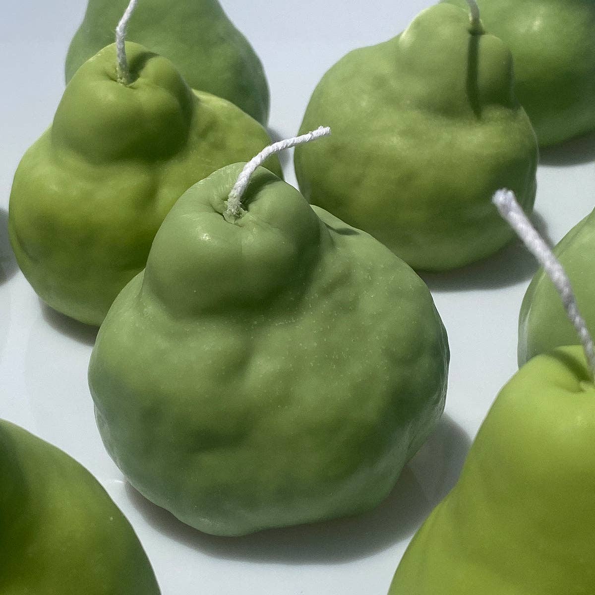 Verde Candela a forma di Pera Verde in vendita all'ingrosso su Faire4