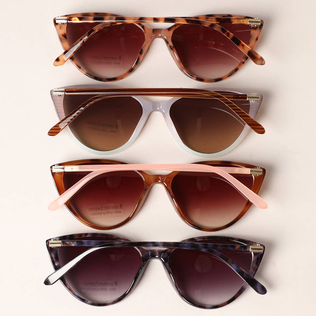 12 COLORI ASSORTITI Occhiali da sole a forma di triangolo Cat Eye con montatura in vendita all'ingrosso su Faire3