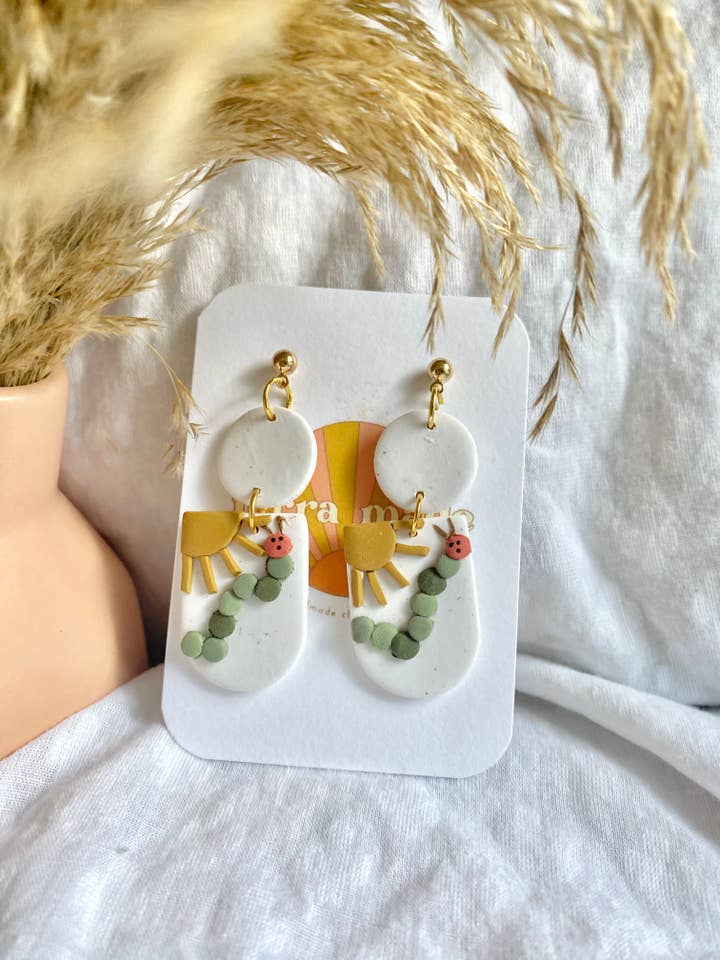 ‘Caterpillar that could’ dangle earrings for wholesale by Terra Made