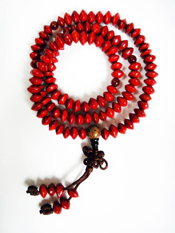 Red Rondel Seed Mala for wholesale by Tika