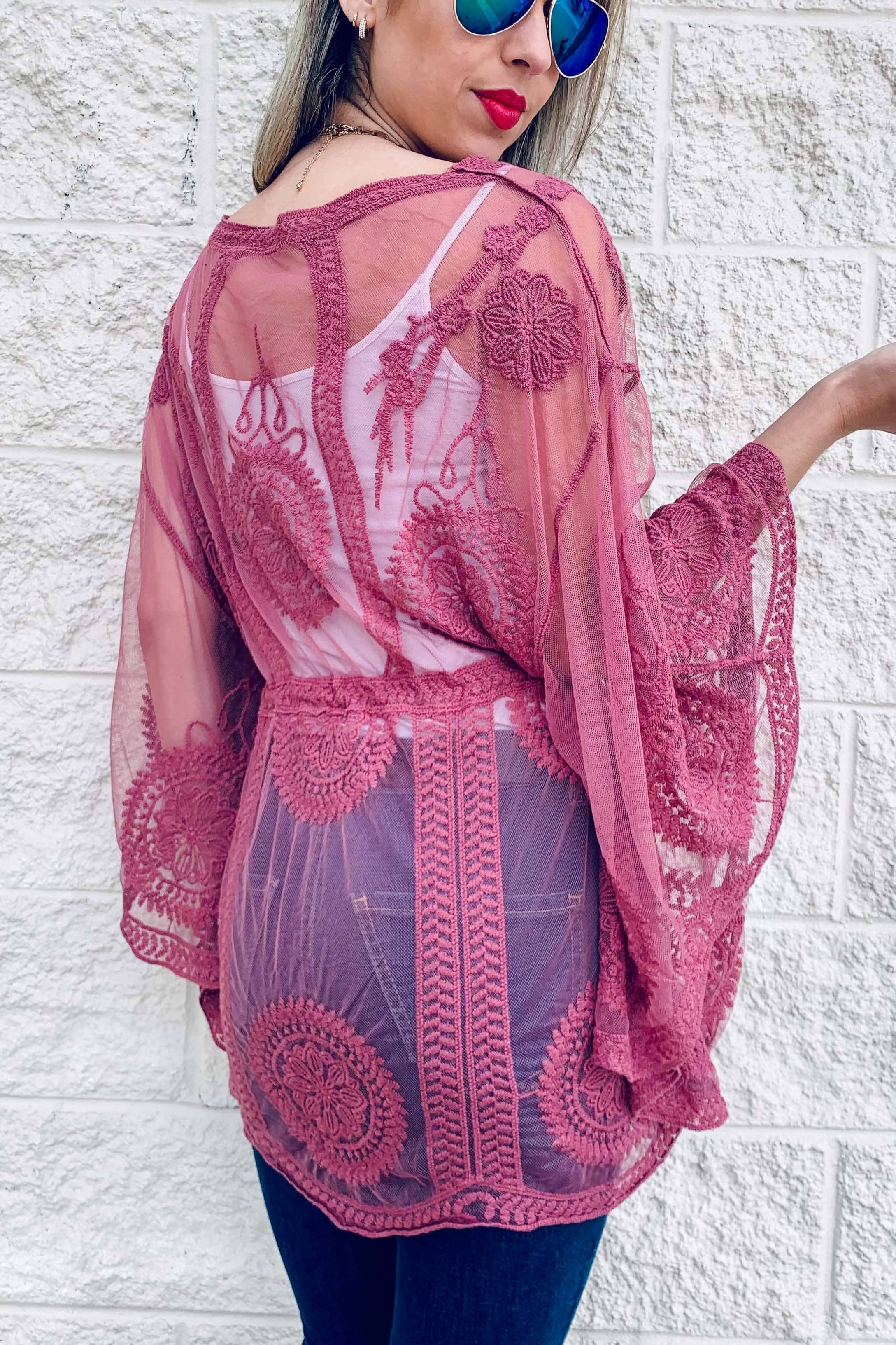 Malva Top trasparente floreale classico color malva con poncho con cintura a nappine in vendita all'ingrosso su Faire4