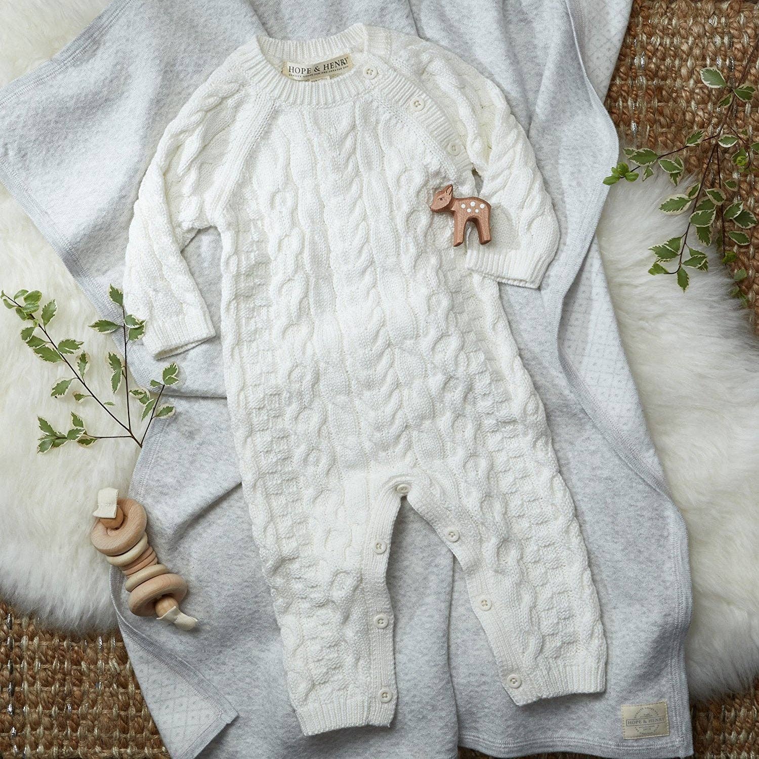 Soft White Organic Cable Knit Sweater Romper for wholesale on Faire4