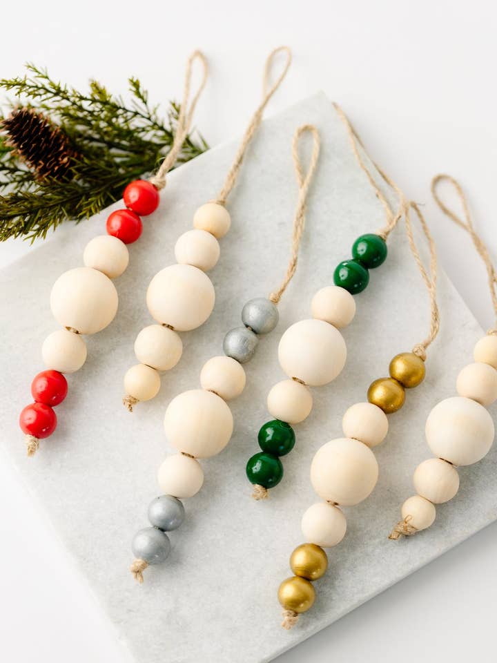 Lola Wood Bead Ornament for wholesale by Vi Bella