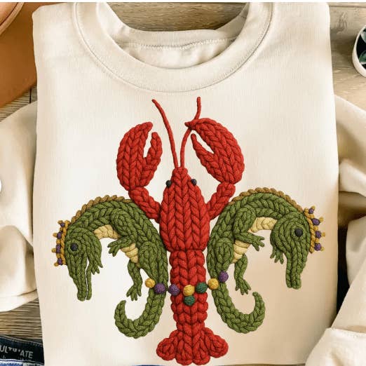 Abbigliamento grafico con motivo di gamberi all'uncinetto finto per la vendita all'ingrosso da parte di Kindred Flame Outfitters