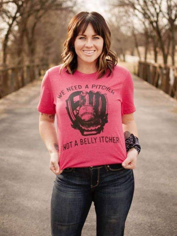 We Need A Pitcher Not A Belly Itcher | Game Day T-Shirt | Ruby’s Rubbish® for wholesale by Ruby’s Rubbish