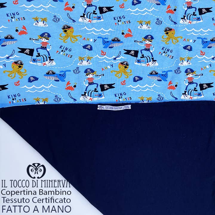 Newborn Cover in Certified Cotton Pirates light blue background - Handmade for wholesale by Il Tocco di Minerva