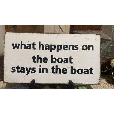 WHAT HAPPENS ON THE BOAT STAYS IN THE BOAT for wholesale by Dudley's Cottage & Gifts