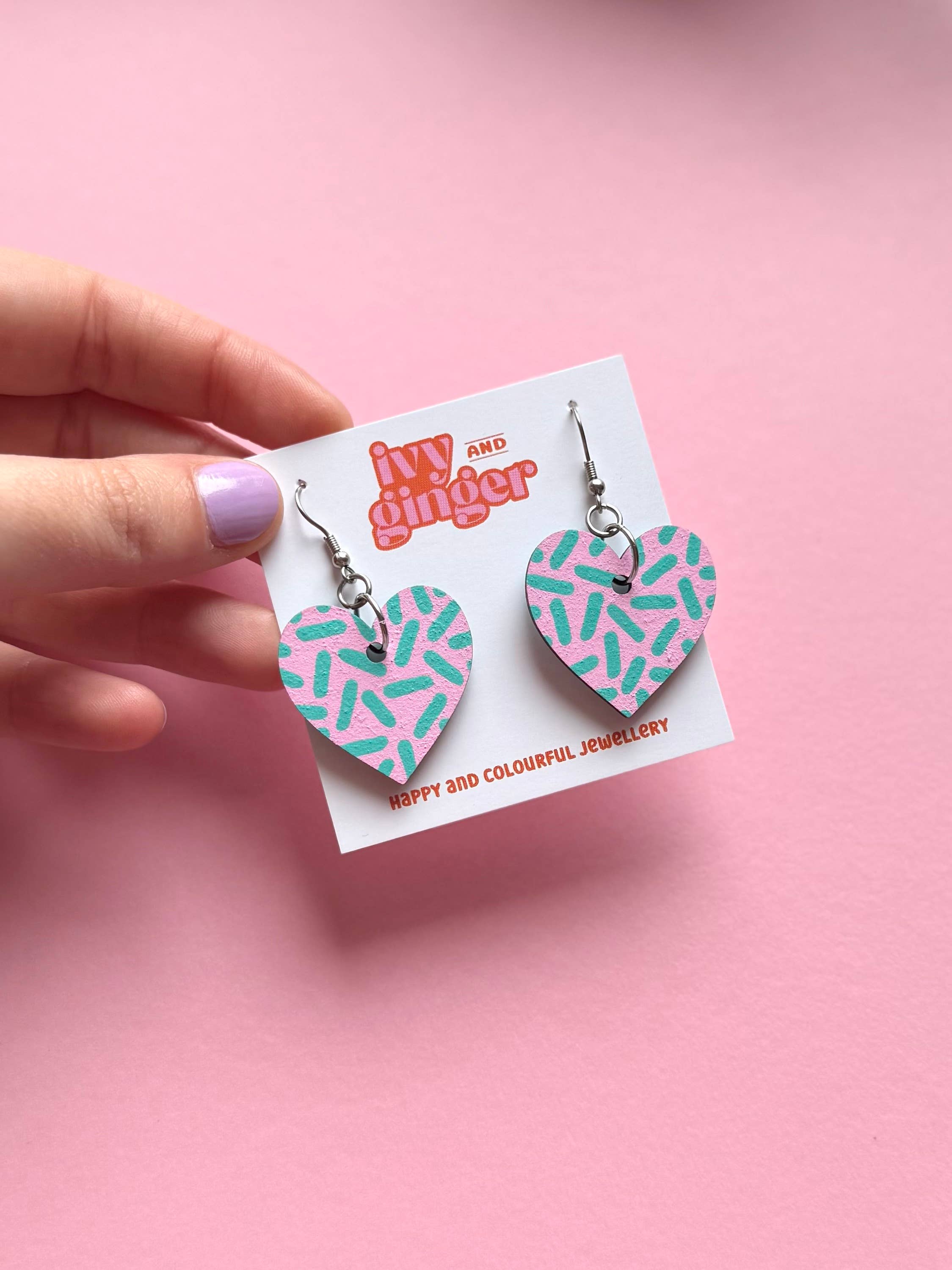 ivy and ginger – wholesale Dangle earrings – Large pink and mint dash print heart shaped dangle earrings