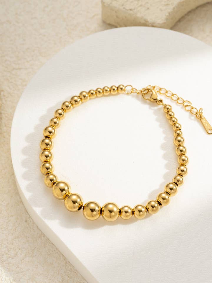 Gradient bead bracelet in stainless steel solar shine for wholesale by COSMOS