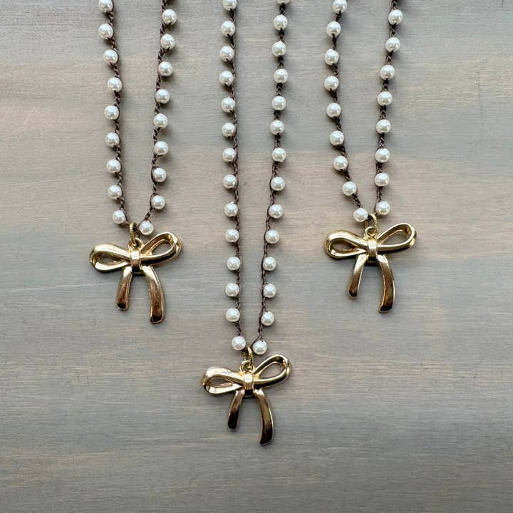 French Bow Pendant Necklace With Crocheted Glass Pearls for wholesale by Twist Style