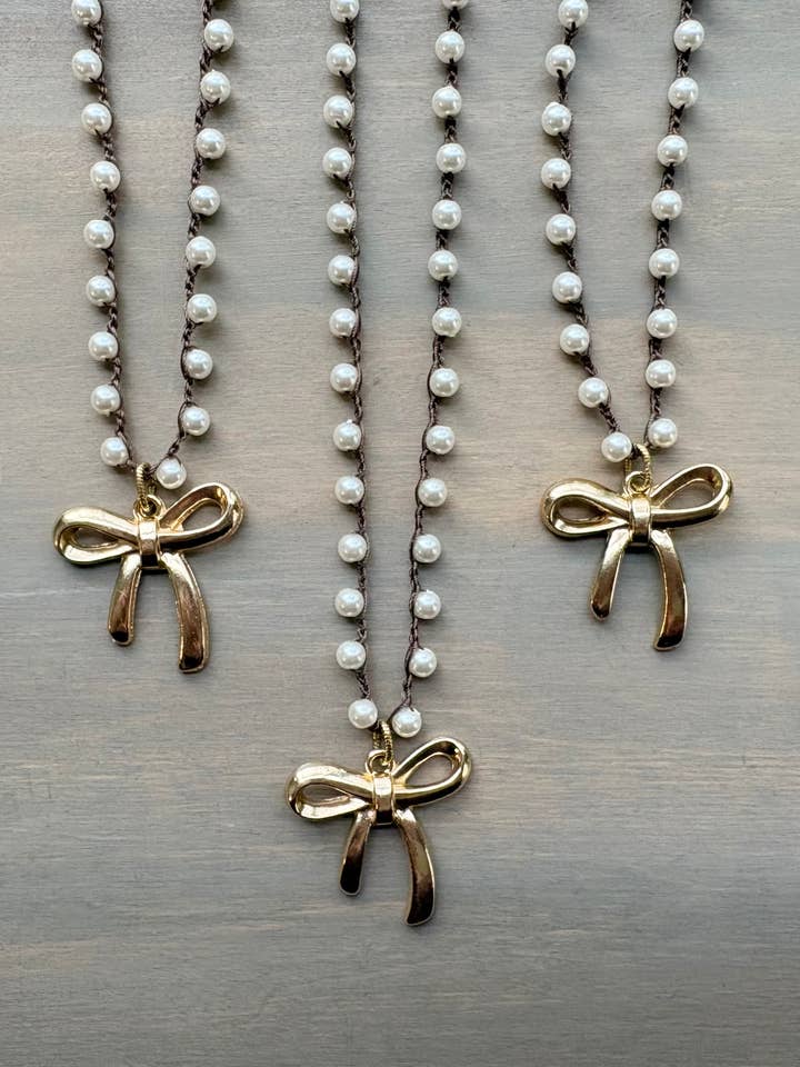 French Bow Pendant Necklace With Crocheted Glass Pearls for wholesale by Twist Style