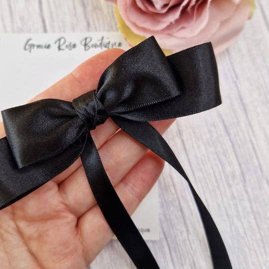 Black satin hair bow clip for wholesale by Gracie Rose Bowtique