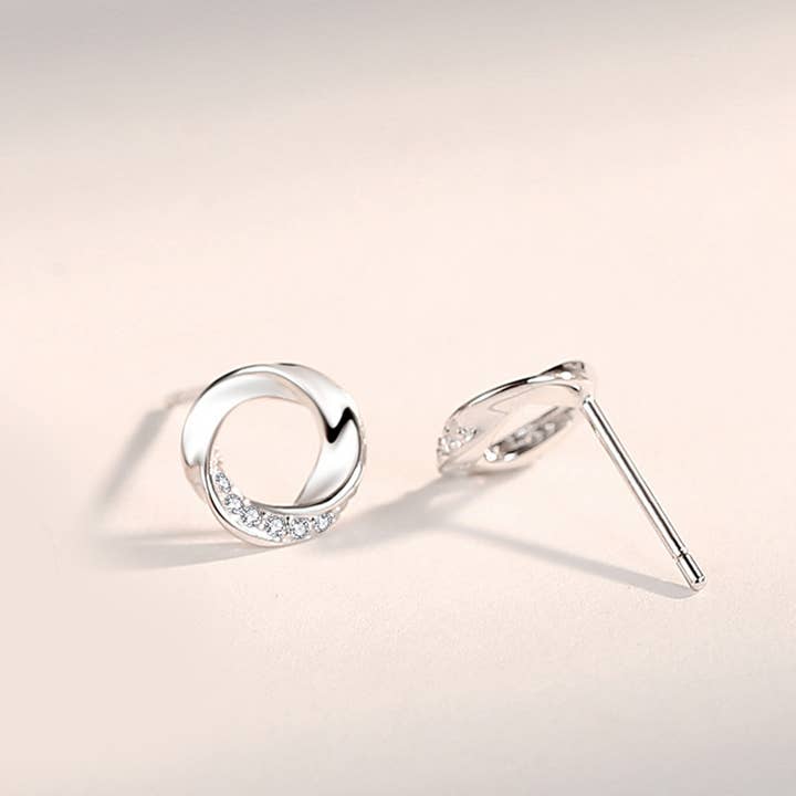 Infinity Mobius Twist Stud Earrings in 925 Sterling Silver and other Purchase Wholesale englische möbel. Free Returns & Net 60 Terms on Faire trending on Faire.