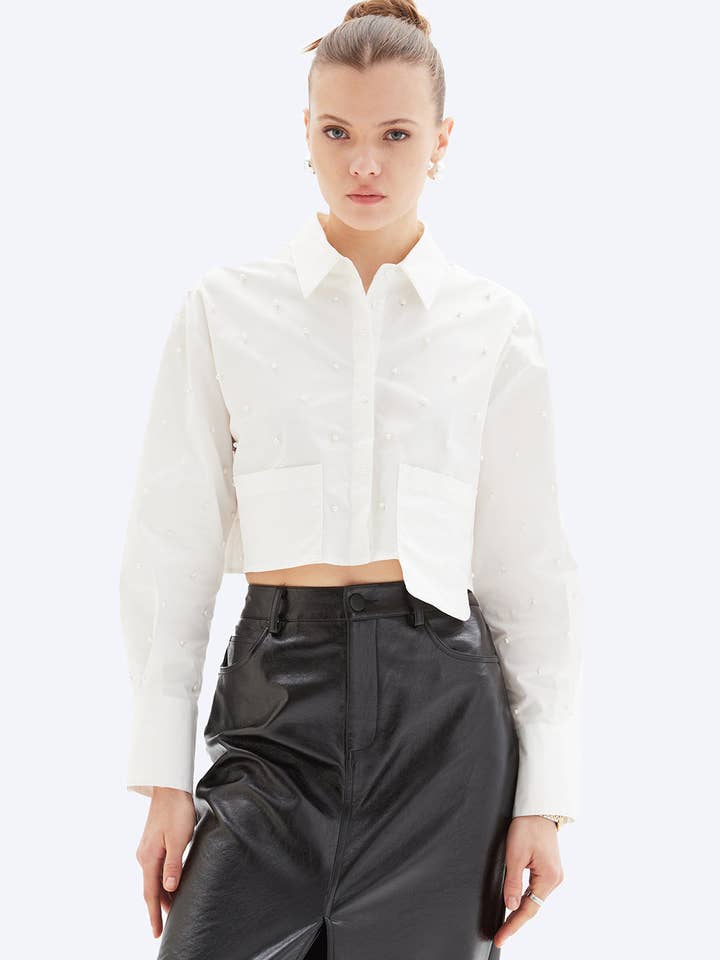 LAURA PEARL - Chemise à poche asymétrique pour la vente par CHRLDR